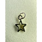 Dije estrellita mini calada