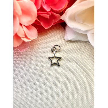 Dije estrellita mini calada