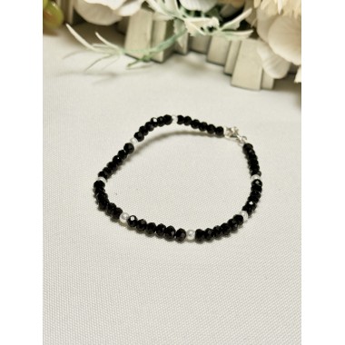 PULSERA CRISTAL NEGRA CON PERLITAS.